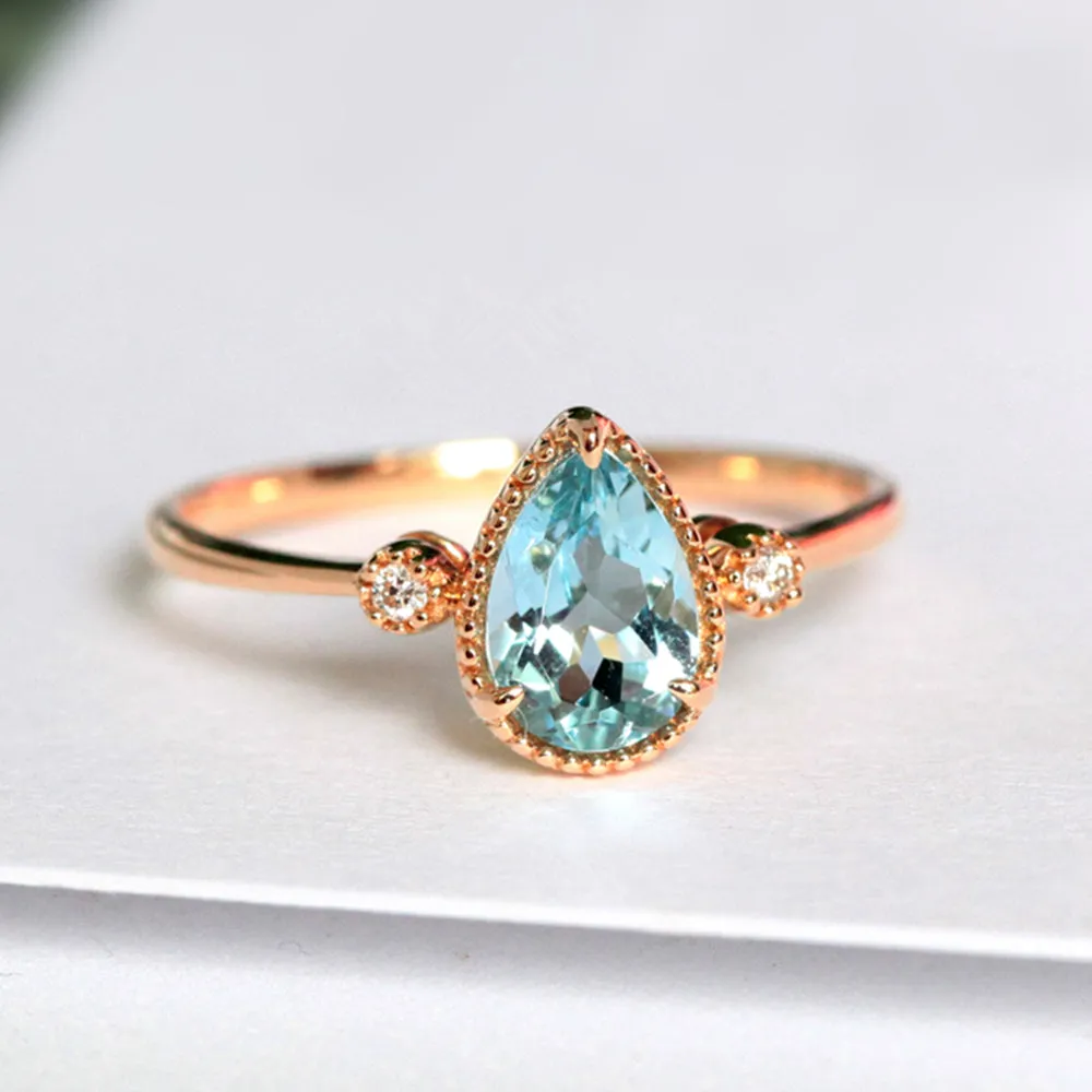 Pear Shaped Aquamarine & Diamond Three Stone Ring