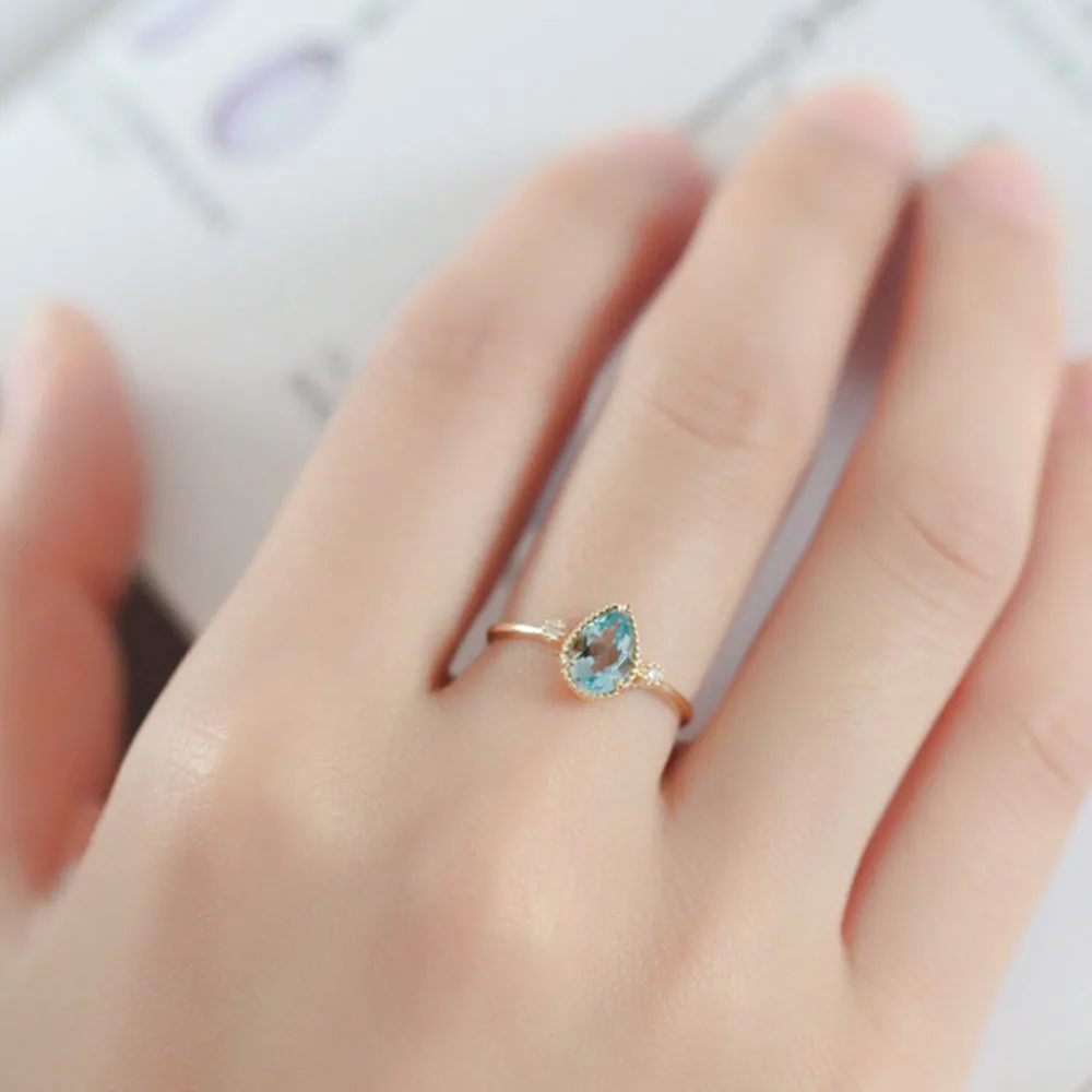 Pear Shaped Aquamarine & Diamond Three Stone Ring