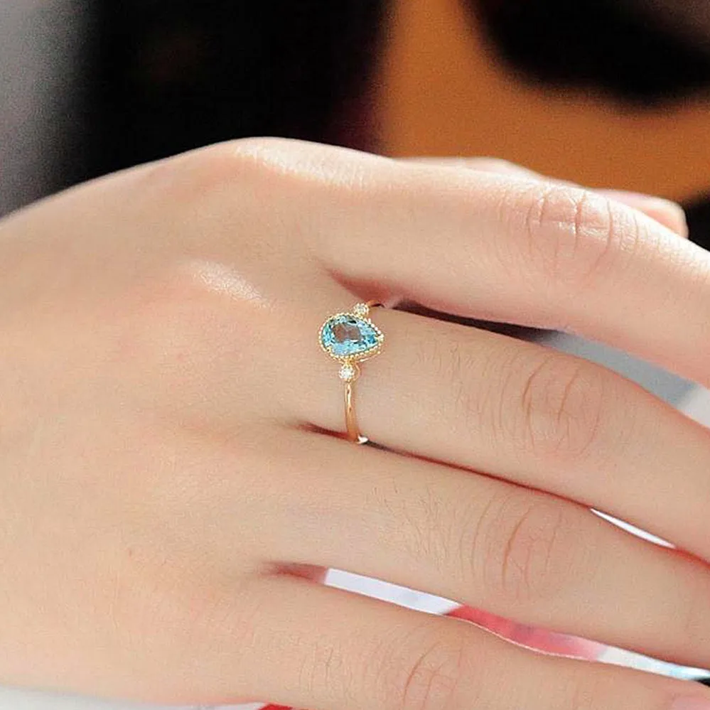 Pear Shaped Aquamarine & Diamond Three Stone Ring