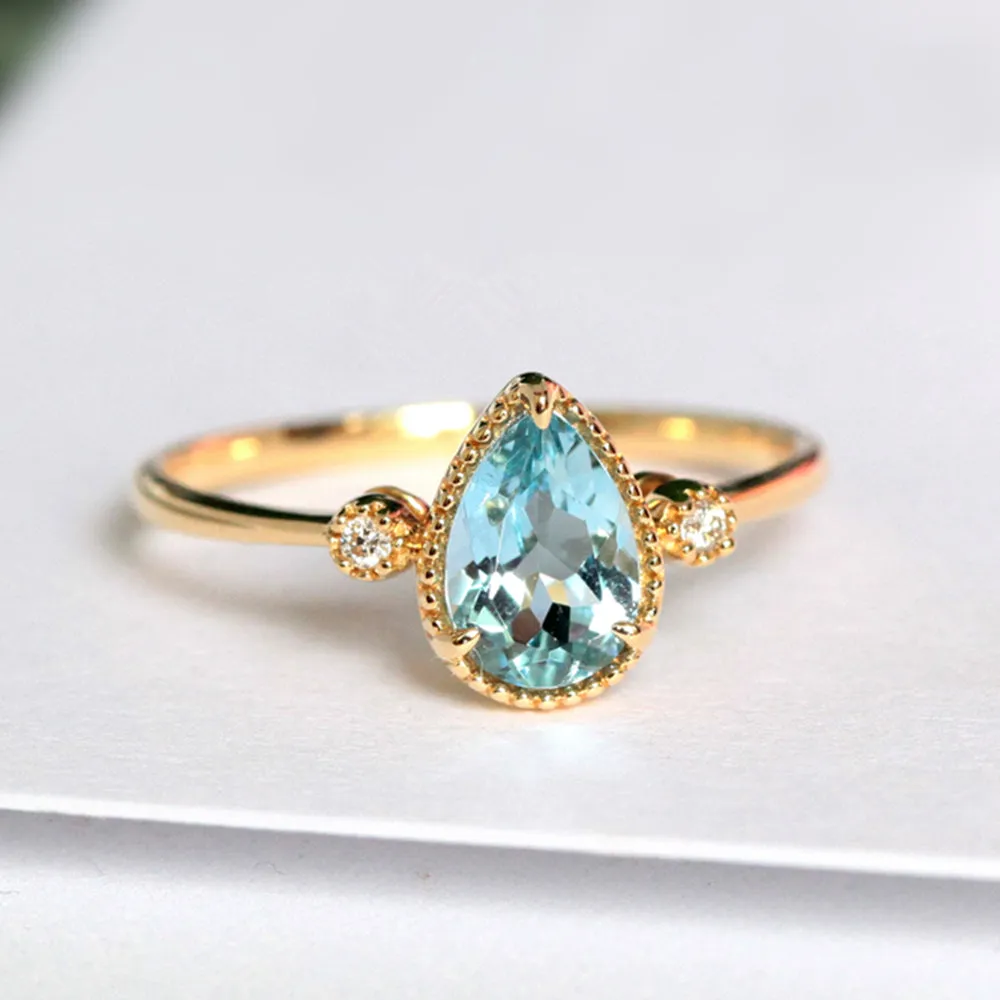 Pear Shaped Aquamarine & Diamond Three Stone Ring