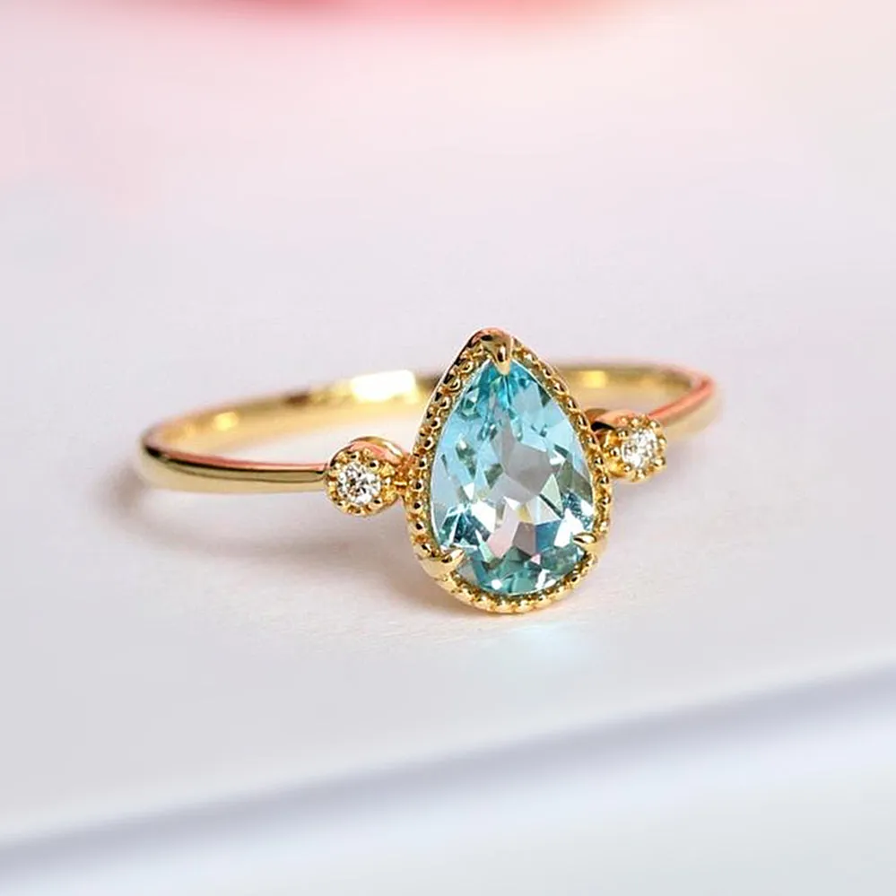 Pear Shaped Aquamarine & Diamond Three Stone Ring