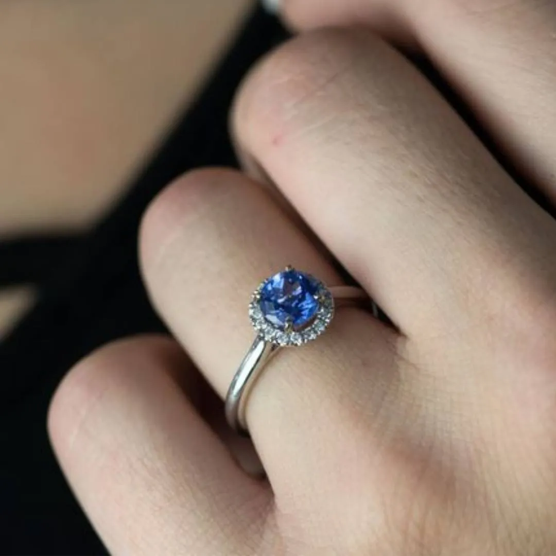 Round Tanzanite and Diamond Halo Ring