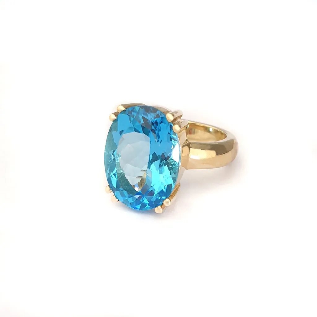 Solid Solitaire Deep Blue Topaz Oval Cut Double Claw Ring